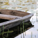 Old boat and moss on the river  screen for extension Chrome web store in OffiDocs Chromium