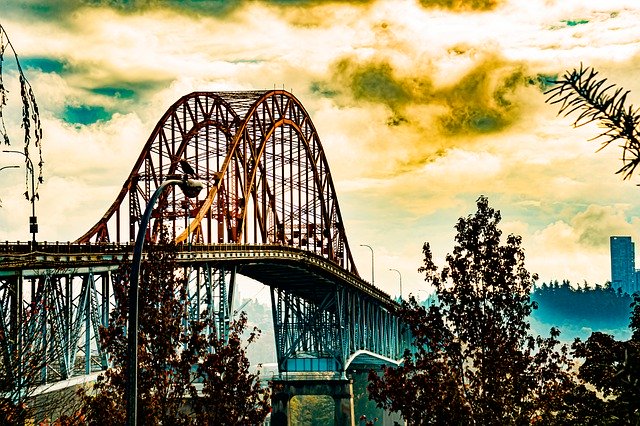 Download gratuito Orange Clouds Cantilever Bridge - foto o immagine gratuita da modificare con l'editor di immagini online GIMP