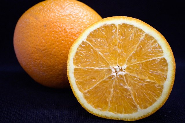 Faça o download gratuito da fatia de comida de frutas laranja meia imagem gratuita para ser editada com o editor de imagens on-line gratuito do GIMP