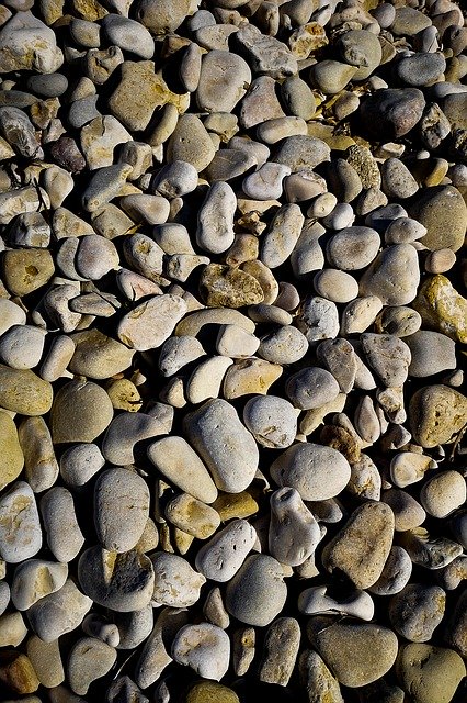 Téléchargement gratuit de Pebble Beach Sea - photo ou image gratuite à modifier avec l'éditeur d'images en ligne GIMP