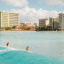 People In Hotel Surfing the Sea Waves  screen for extension Chrome web store in OffiDocs Chromium