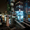 People Standing on the Street on a Rainy Night  screen for extension Chrome web store in OffiDocs Chromium