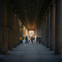 People walking through a long hallway with columns  screen for extension Chrome web store in OffiDocs Chromium