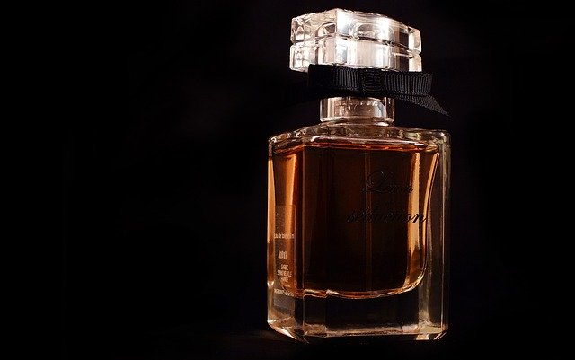 Free download Perfume Black Background Feminine -  free free photo or picture to be edited with GIMP online image editor