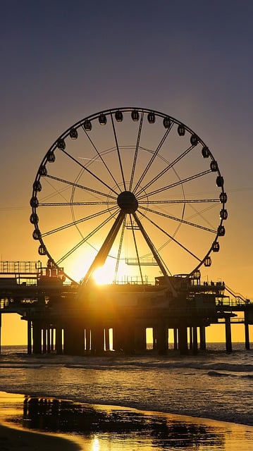 Free graphic pier ferris wheel attraction sunset to be edited by GIMP free image editor by OffiDocs