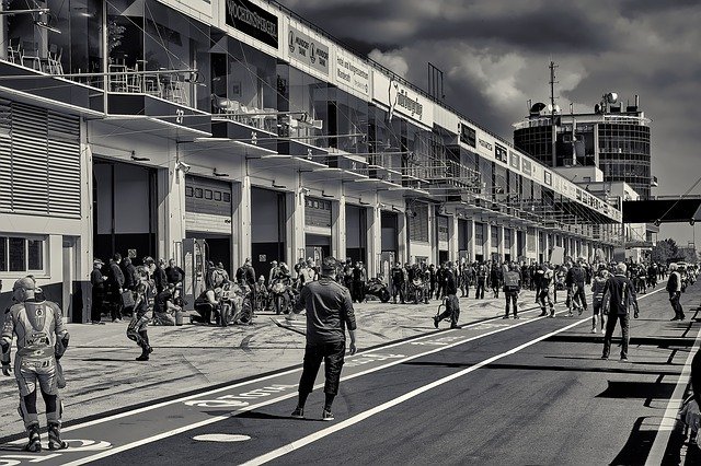 Free download Pit Lane Crew Motorcycle -  free photo or picture to be edited with GIMP online image editor