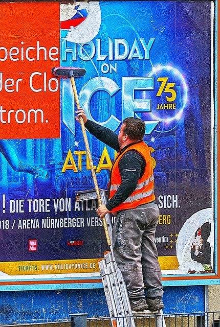 Free download Poster Sticking Advertising -  free photo or picture to be edited with GIMP online image editor