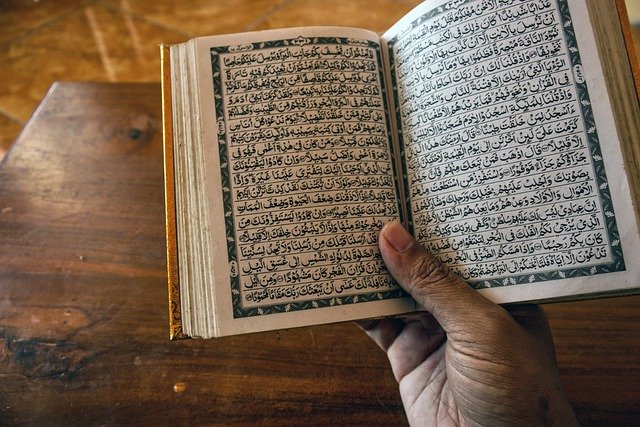 Free download quran book hand islam holy book free picture to be edited with GIMP free online image editor