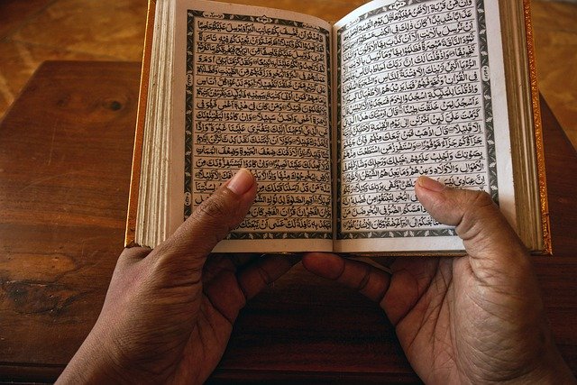 Free download quran book hands islam holy book free picture to be edited with GIMP free online image editor