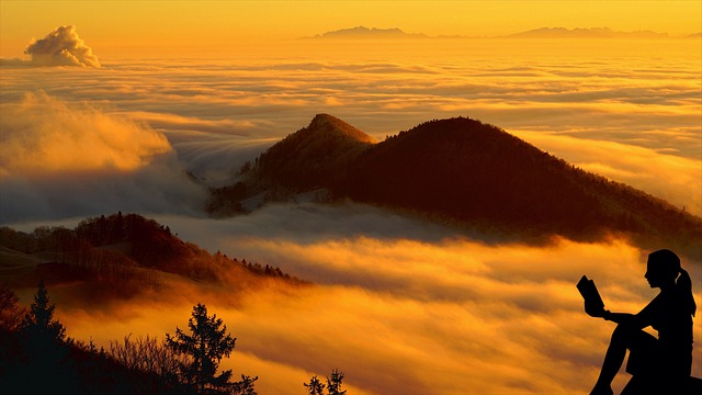 Free download reading sea of clouds mountains free picture to be edited with GIMP free online image editor