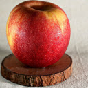Red apple on wooden base  screen for extension Chrome web store in OffiDocs Chromium