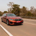 Red Car Driving on the Road  screen for extension Chrome web store in OffiDocs Chromium