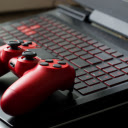 Red Game Controller on a Laptop  screen for extension Chrome web store in OffiDocs Chromium