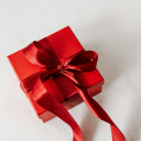 Red gift box  screen for extension Chrome web store in OffiDocs Chromium