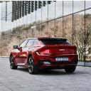 Red Kia EV6 by Windows of Modern Building  screen for extension Chrome web store in OffiDocs Chromium