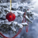 Red Ornament on Snowy Tree  screen for extension Chrome web store in OffiDocs Chromium