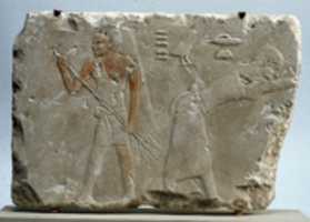 Free download Relief fragment depicting two figures winnowing free photo or picture to be edited with GIMP online image editor