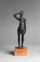 Free download Reproduction of a bronze votive statuettte of a man free photo or picture to be edited with GIMP online image editor