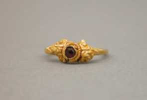 Free download Ring with Purple Stone Surrounded by Foliate Designs free photo or picture to be edited with GIMP online image editor