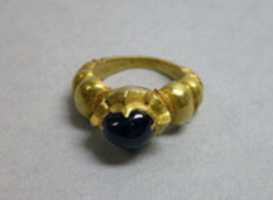 Free download Ring with Reddish-purple Stone and Ribbed Hoop free photo or picture to be edited with GIMP online image editor