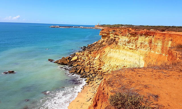 Téléchargement gratuit d'une image gratuite de la falaise de la côte rocheuse costa de la luz à modifier avec l'éditeur d'images en ligne gratuit GIMP