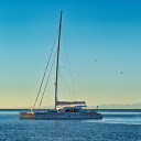 Sailboat on the blue sea  screen for extension Chrome web store in OffiDocs Chromium