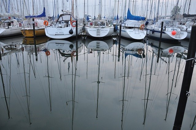 Free download sailboats sea still water o ocean free picture to be edited with GIMP free online image editor