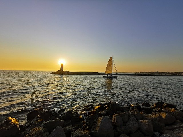 Free download Sailboat Sunset Lighthouse -  free photo or picture to be edited with GIMP online image editor