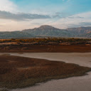 sandy desert and mountain ranges  screen for extension Chrome web store in OffiDocs Chromium