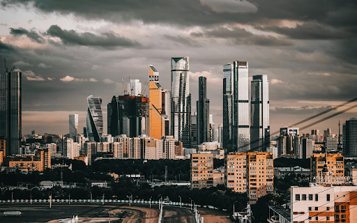 A Cityscape under a Cloudy Sky  from Chrome web store to be run with OffiDocs Chromium online