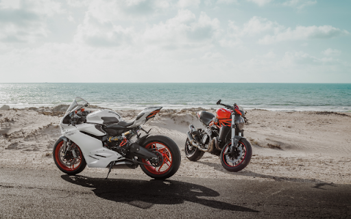 A Duo of Ducati Delights: The 959 Panigale and Monster 1200  from Chrome web store to be run with OffiDocs Chromium online