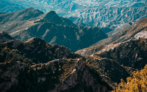 Aerial Photography of a Mountain Range  from Chrome web store to be run with OffiDocs Chromium online