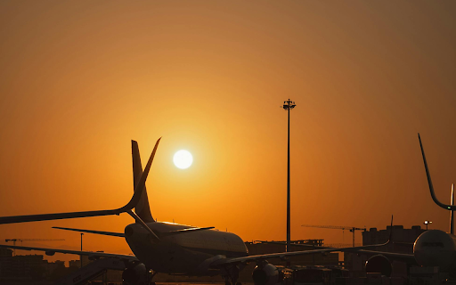 Airplane Silhouette During Sunset at Airport  from Chrome web store to be run with OffiDocs Chromium online