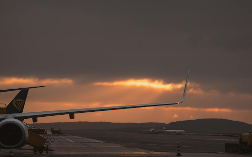 Airplane Wing Against a Dramatic Sunset in Ankara  from Chrome web store to be run with OffiDocs Chromium online