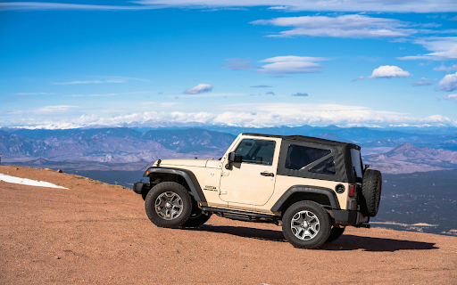 A Jeep JK on a Mountain  from Chrome web store to be run with OffiDocs Chromium online