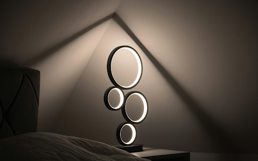 A lamp with circles on it in a bedroom  from Chrome web store to be run with OffiDocs Chromium online