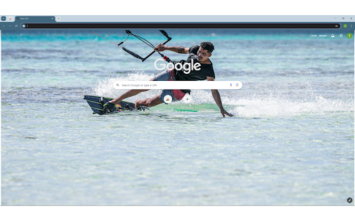 A Man Touching the Water while Kitesurfing  from Chrome web store to be run with OffiDocs Chromium online