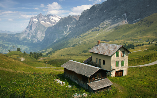 A mountain hut overlooks a spectacular valley in the Swiss alps  from Chrome web store to be run with OffiDocs Chromium online