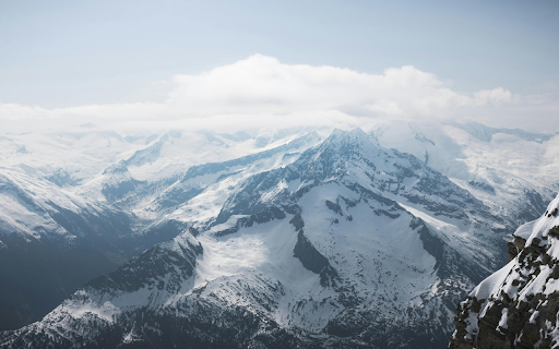 a mountain looking at the snow covered mountain  from Chrome web store to be run with OffiDocs Chromium online