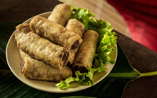A plate of crispy fried spring rolls  from Chrome web store to be run with OffiDocs Chromium online