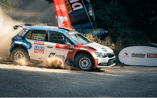 A Rally Skoda Fabia R5 on a Dusty Track  from Chrome web store to be run with OffiDocs Chromium online
