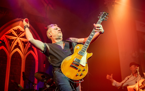 Artist burns with electric guitar  from Chrome web store to be run with OffiDocs Chromium online
