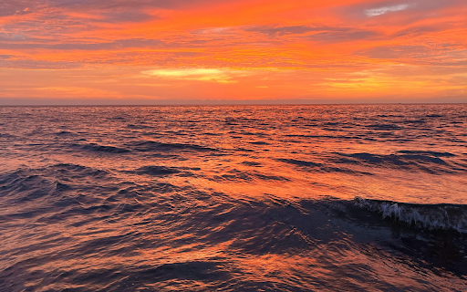 A Scenic Sunset at Sea  from Chrome web store to be run with OffiDocs Chromium online