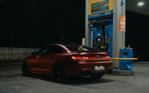 A Sports Car at a Gas Station  from Chrome web store to be run with OffiDocs Chromium online
