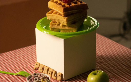 A Stack of Waffles on a Green Plate  from Chrome web store to be run with OffiDocs Chromium online