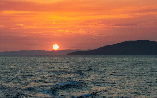 A Sunset at Sea  from Chrome web store to be run with OffiDocs Chromium online