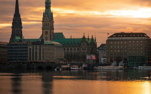 A sunset over the water with a church in the background  from Chrome web store to be run with OffiDocs Chromium online