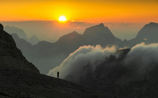 A view of mountains and valleys at sunset  from Chrome web store to be run with OffiDocs Chromium online