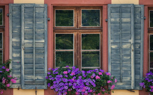 A window with purple flowers and shutters  from Chrome web store to be run with OffiDocs Chromium online