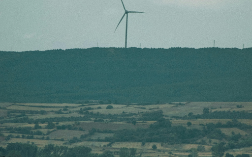A Wind Turbine near a Rural Area  from Chrome web store to be run with OffiDocs Chromium online